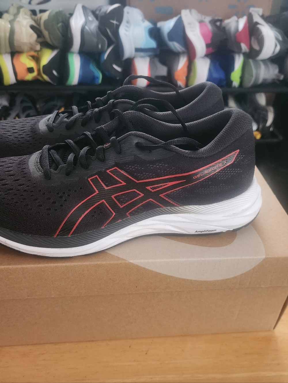 ASICS Black Running Shoes with Red Accents